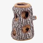 Squirrel enrichment dog toy resembling a tree trunk with plush squirrels inside. Interactive pet toy for mental stimulation and play.