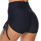 Navy blue high-waisted textured sports shorts with side drawstrings, designed for women, ideal for gym workouts and activewear fashion.