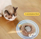 Cat interacting with an electronic toy ball on wooden floor, featuring three modes. Ideal for pet playtime, stimulating cat toy, interactive pet gadget.