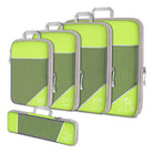 Set of green compression packing cubes with zippers, featuring icons for clothing organization. Ideal for travel, luggage organization, and space-saving packing.