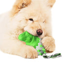 Fluffy dog playing with a green dinosaur chew toy. Durable pet toy, perfect for aggressive chewers. Ideal for dog playtime and dental health.