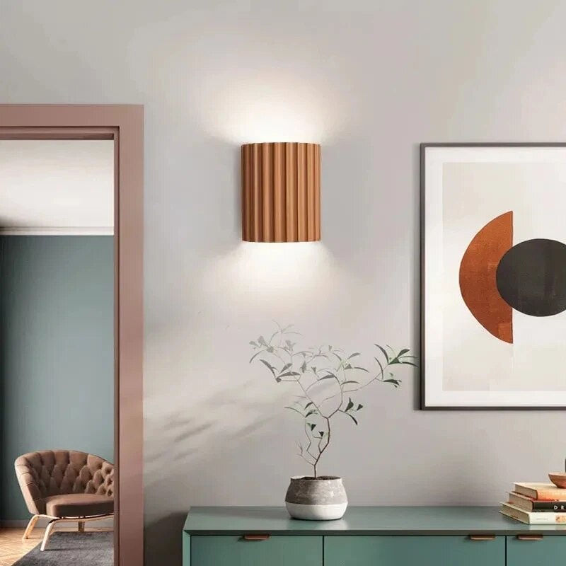 Modern Nordic LED wall lamp with ribbed design, illuminating a stylish living room. Perfect for bedroom, hallway, or interior accent lighting.