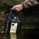 Waterproof bag with smartphone pocket submerged in water, showcasing durability and protection. Ideal for outdoor activities and water sports.