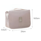 Beige travel toiletry bag with handle, zipper closure, and dimensions 24cm x 18.5cm x 9.5cm. Ideal for organizing cosmetics and toiletries.