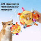 Dog playing with colorful interactive plush toy ball featuring built-in sounds and bells, ideal for pet entertainment and sensory stimulation.