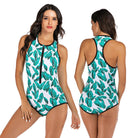 Women's one-piece swimsuit with green leaf print, front zipper, and racerback design. Perfect for beachwear and swimming. Available in white and turquoise.