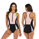 Women's sporty one-piece swimsuit, black and pale pink with front zipper, racerback design, ideal for swimming and beach activities.