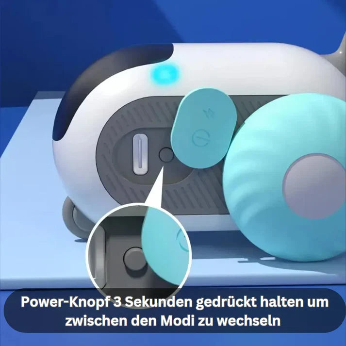 Close-up of a modern white and blue electronic device with a power button, featuring German instructions for mode switching. Tech gadget, user interface.