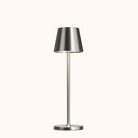 Modern silver table lamp with sleek design, illuminated on a white background. Perfect for contemporary home decor and ambient lighting solutions.