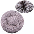 Round fluffy pet bed in light gray, featuring a soft, plush texture for comfort. Ideal for cats and small dogs. Cozy, durable, machine washable.