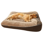 Golden Retriever sleeping on a large, plush orthopedic dog bed with a soft, textured surface. Ideal for pet comfort and joint support.