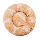 Round fluffy pet bed in light brown with white patterns, designed for cats and small dogs. Cozy, plush donut shape for comfort and warmth.