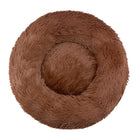 Brown fluffy round pet bed, donut shape, soft plush material, ideal for cats and small dogs, cozy and comfortable sleeping cushion.