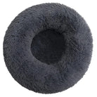 Round fluffy gray pet bed, donut shape, plush faux fur, cozy and comfortable for cats and small dogs, ideal for relaxation and sleep.