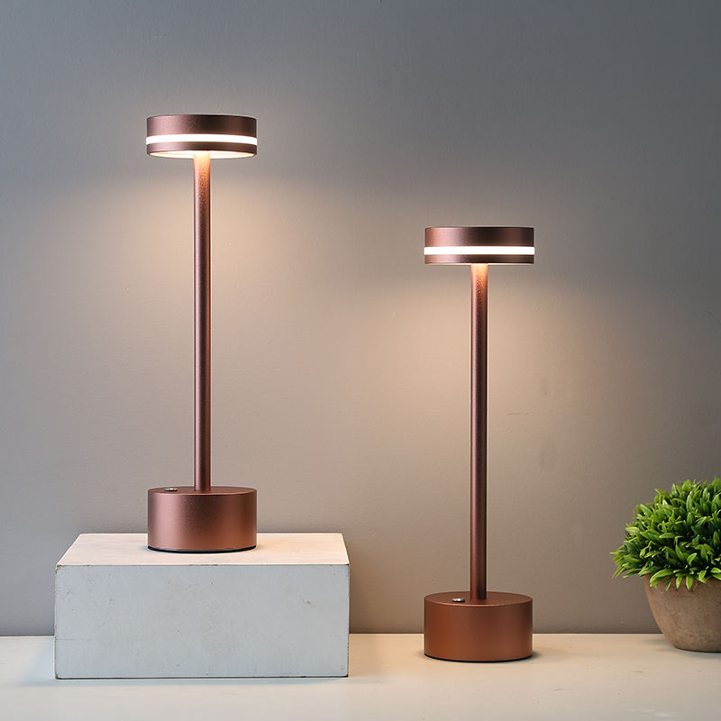 Modern copper LED table lamps with sleek design, featuring adjustable brightness. Perfect for home decor, office lighting, and ambient illumination.