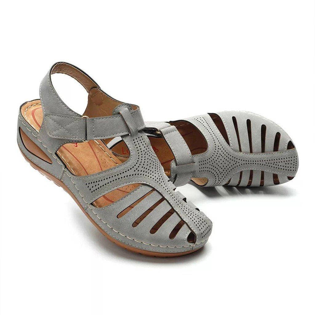 Gray orthopedic sandals with low heel, breathable design, and correction function. Ideal for comfort and support. Perfect for casual wear.