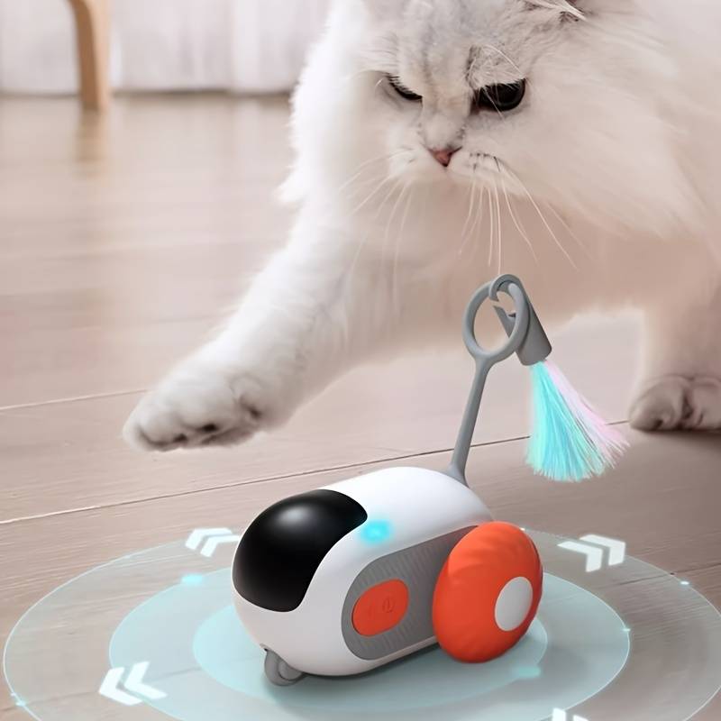 Fluffy white cat playing with interactive robotic cat toy on wooden floor; features colorful feather, motion sensor, and LED lights.