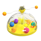 Colorful interactive pet toy with spinning windmill design, featuring vibrant balls and feathers inside a transparent dome. Ideal for pet entertainment.