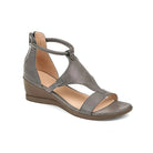 Gray leather wedge sandal with ankle strap, open toe, and cushioned footbed. Stylish women's footwear for casual and formal occasions.