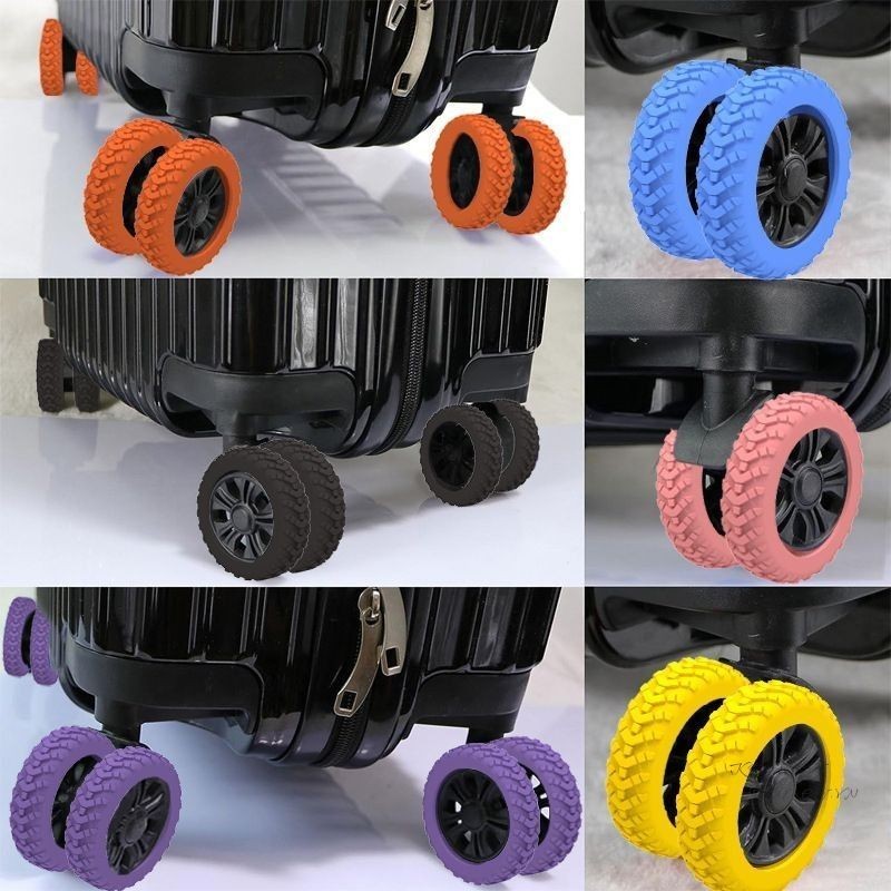 Colorful luggage wheels on a black suitcase, featuring orange, blue, pink, purple, and yellow rubber tires. Durable, stylish travel accessory.