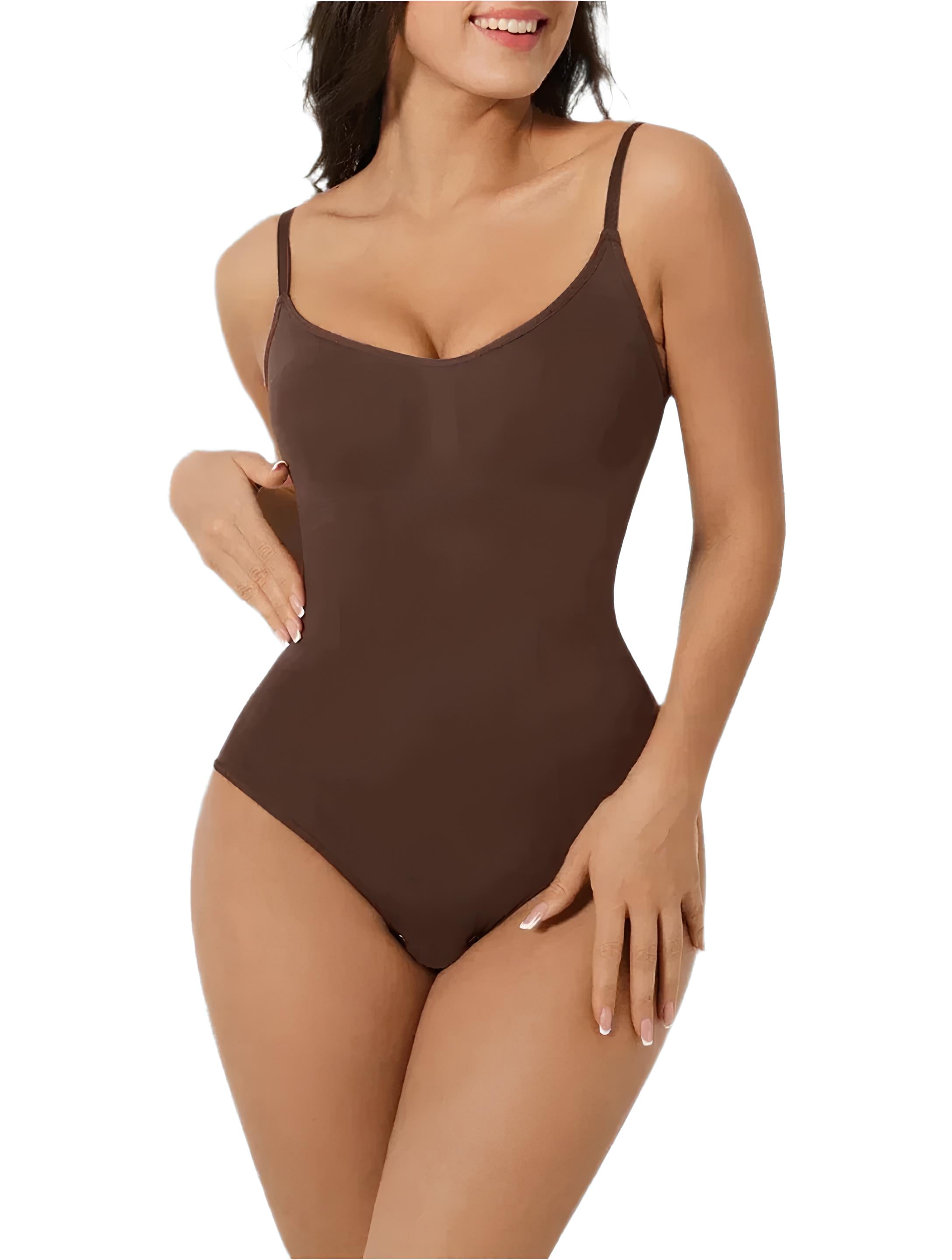 Brown seamless bodysuit with thin straps, worn by a model. Perfect for shapewear, offering a sleek, comfortable fit. Ideal for fashion and lingerie.