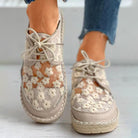 Stylish airy shoes with floral pattern, beige lace-up design, casual women's footwear, comfortable espadrille sole, perfect for summer fashion.