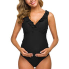 Maternity swimsuit black, ruffled V-neck design, comfortable fit for pregnant women, stylish swimwear for pregnancy, beachwear fashion.