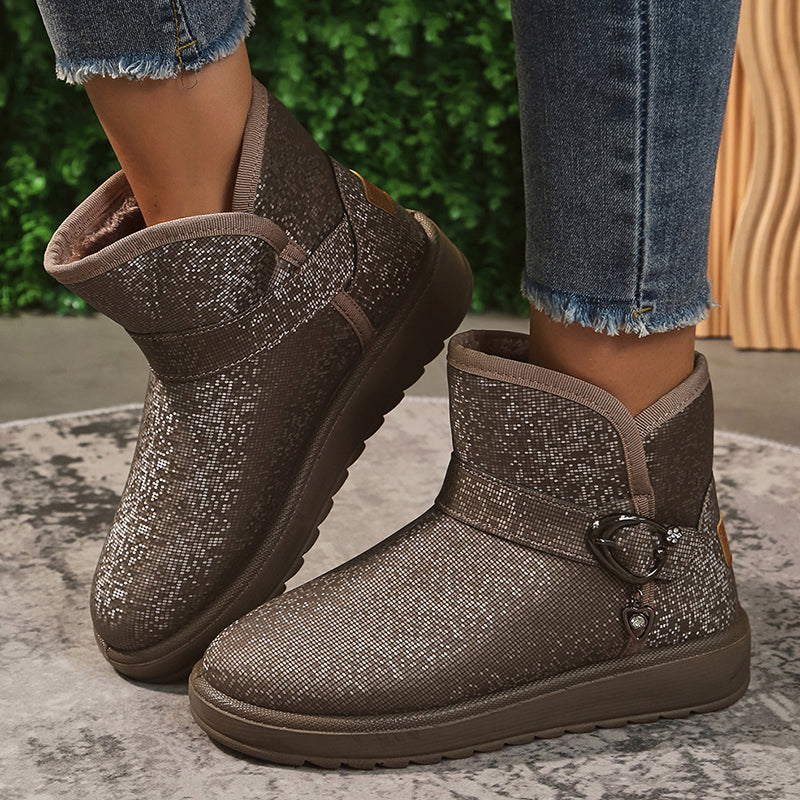 Women's shiny plush snow boots, waterproof and anti-slip, featuring buckle decor. Ideal for winter 2023 fashion. Warm, stylish ankle boots.