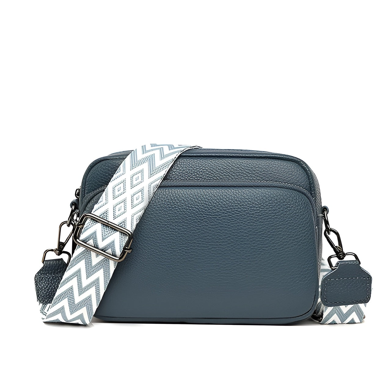 Blue leather crossbody bag with a geometric patterned strap, featuring a front zip pocket. Stylish and versatile accessory for everyday use.