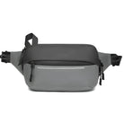 Gray and black waterproof crossbody sling bag with adjustable strap, multiple zippered compartments, and sleek design. Ideal for travel and outdoor activities.