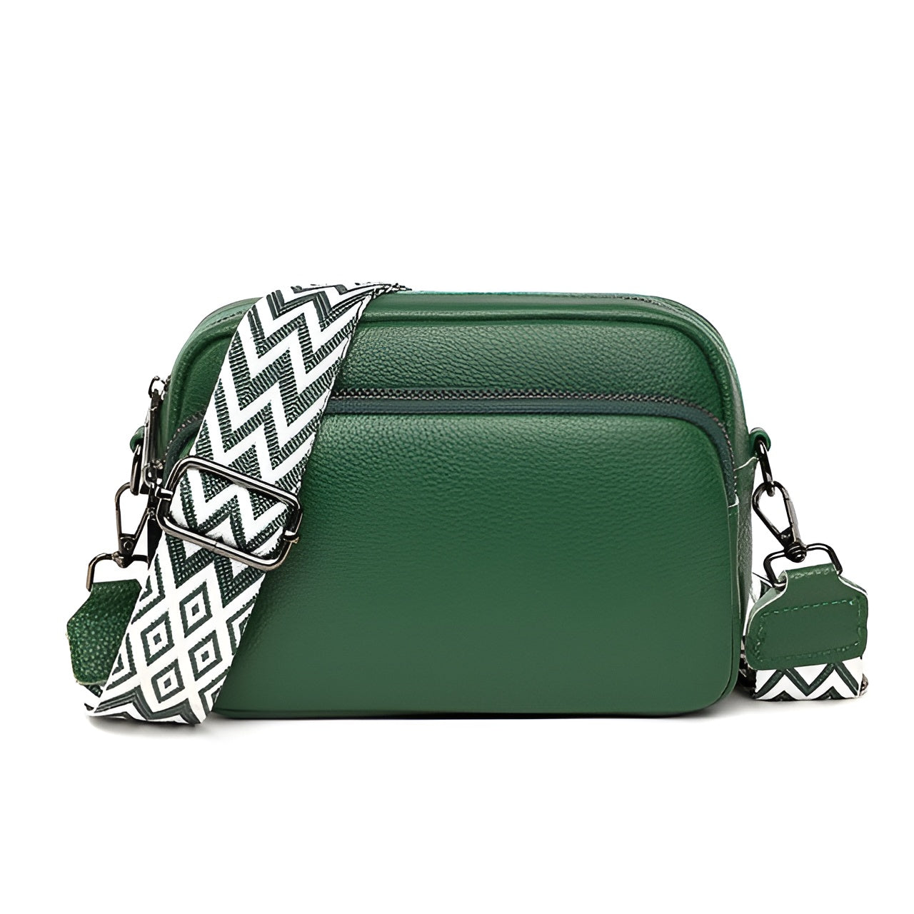 Green leather crossbody bag with geometric patterned strap, featuring a sleek design and durable material. Perfect for fashion-forward, everyday use.