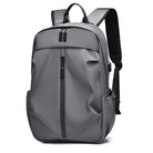 Sleek gray waterproof backpack with front zipper, ergonomic straps, and side pockets. Ideal for travel, school, or work. Durable and stylish design.