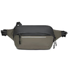 Olive green and black waterproof crossbody sling bag with adjustable straps, front zipper pocket, and sleek design. Ideal for travel and outdoor activities.