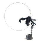 Black and white feather cat toy with suction cup base, interactive pet play accessory, durable wire, engaging exercise for cats, indoor activity.