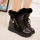 Black women's winter platform boots with faux fur lining, glossy finish, and side zipper. Stylish snow boots for warmth and comfort.